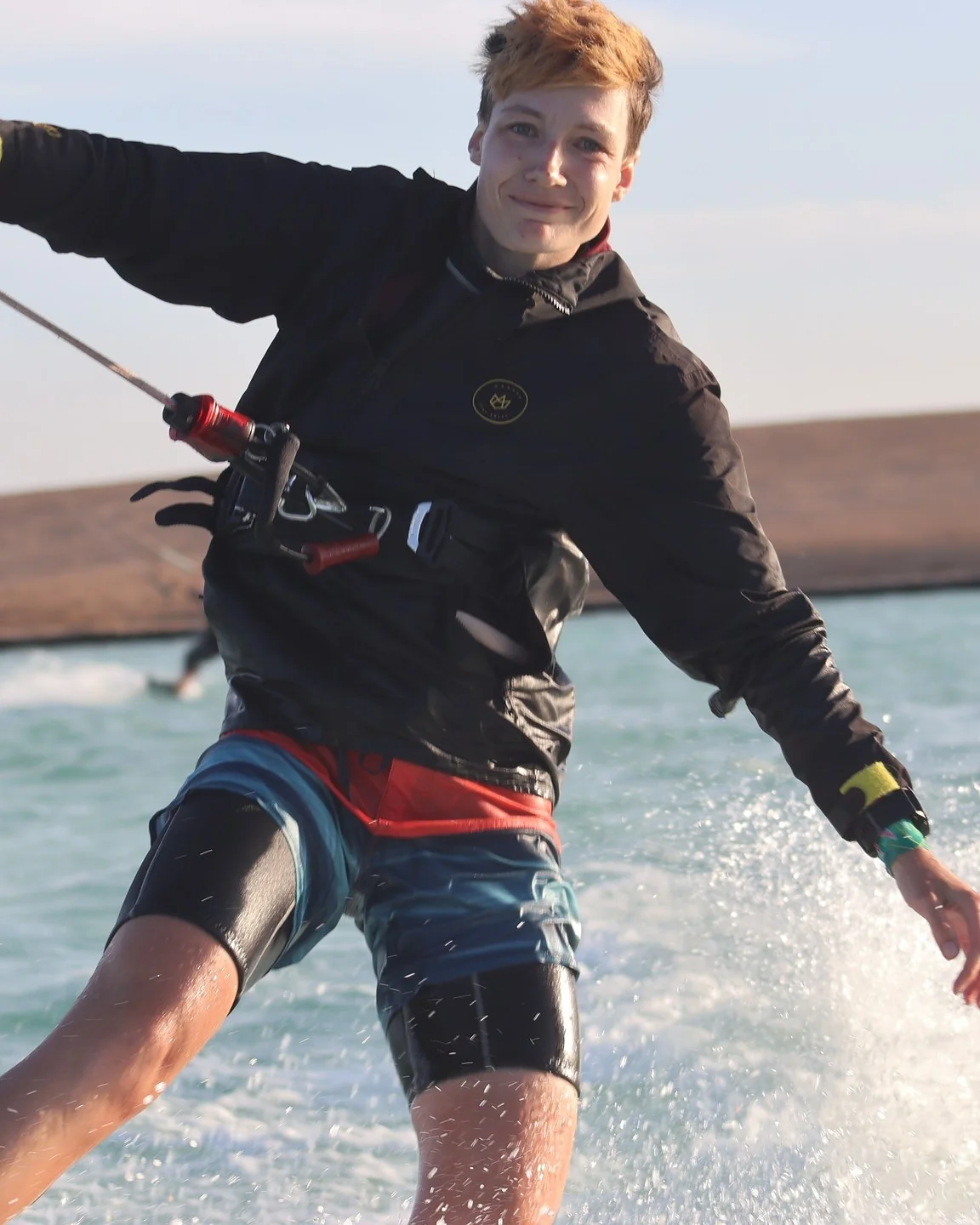 Ing. Jana Hrabalová (Jája) on a twin-tip in a lagoon on the kite safari